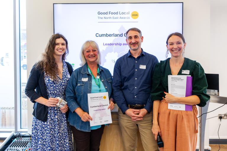 Members of Food Cumberland Partnership being presented a leadership award by Sustain
