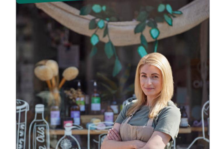 Small changes, big difference - find your local refill shop text at top.  Picture of girl standing in apron outside refill shop which has bottles drawn on window in white pen